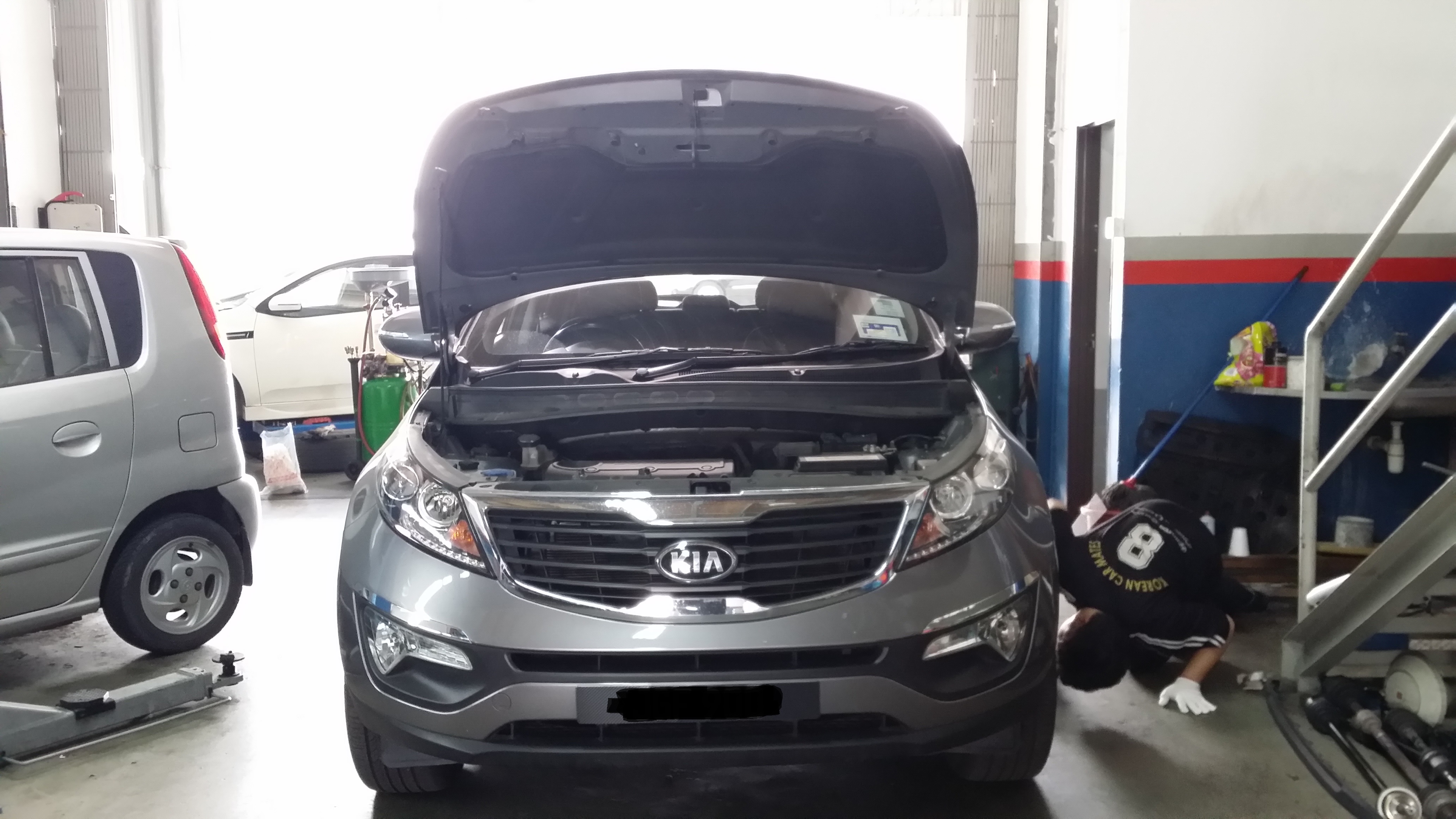 Kia vehicle in service bay