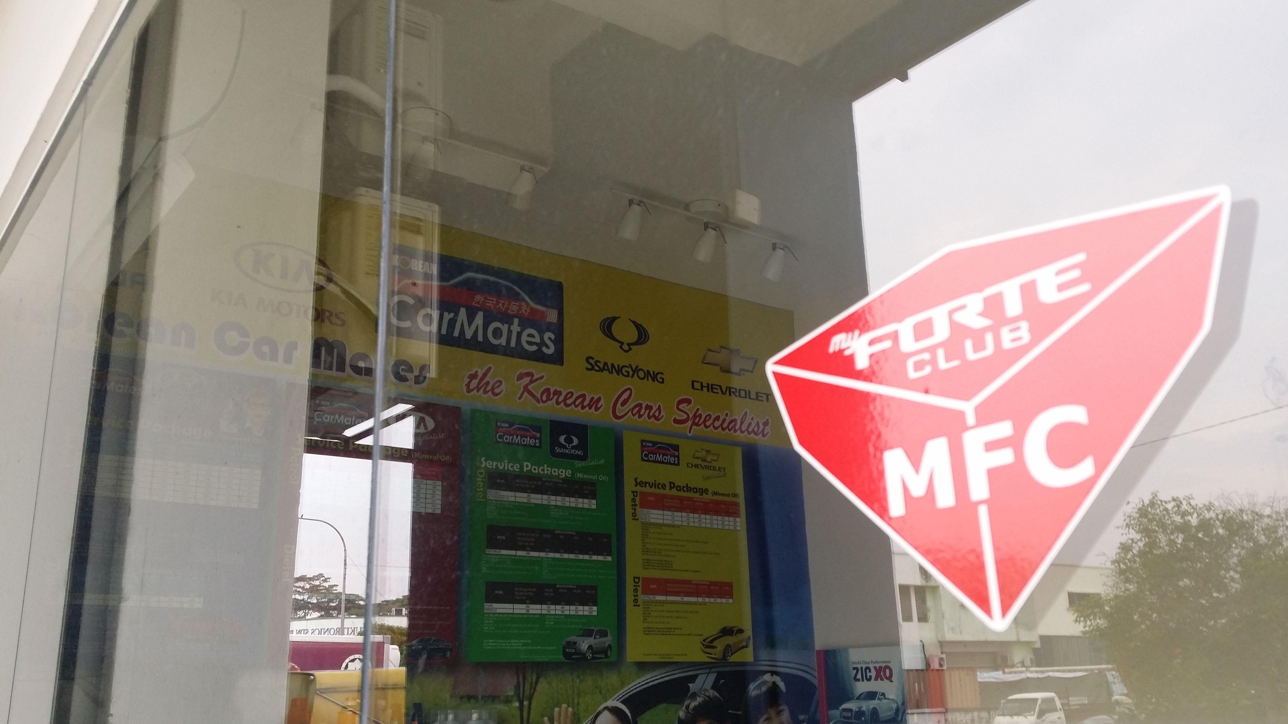 Workshop display viewed through glass